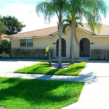 Rent this 2 bed townhouse on 1309 Riverside Circle in Wellington, Palm Beach County