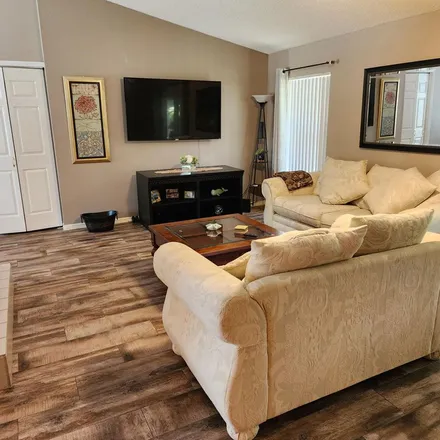 Rent this 2 bed apartment on 1536 Nebraska Street Northeast in Palm Bay, FL 32907