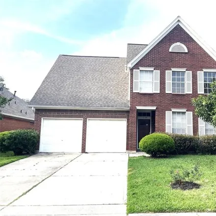 Rent this 4 bed house on 1226 Sandy Plains Ln in Houston, Texas