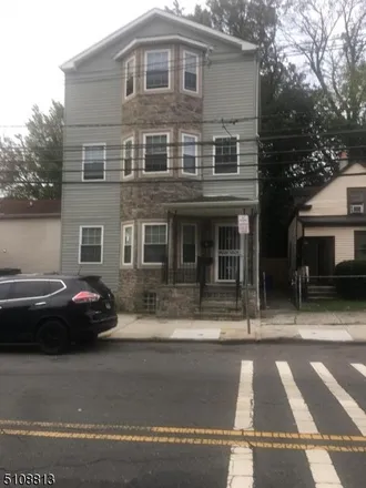 Buy this 5 bed townhouse on 80 11th Avenue in Newark, NJ 07107