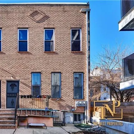 Buy this 4 bed house on 1251 Decatur Street in New York, NY 11207
