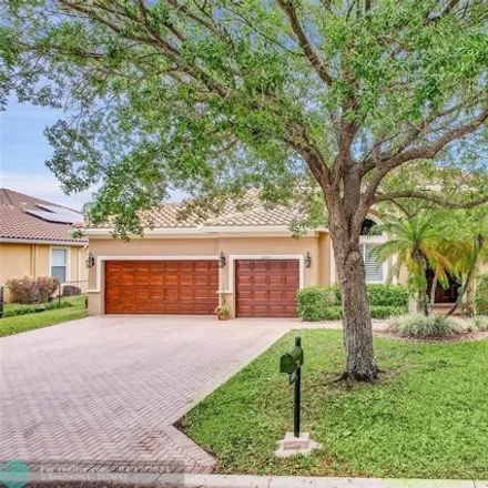Buy this 5 bed house on 5079 Northwest 112th Drive in Coral Springs, FL 33076