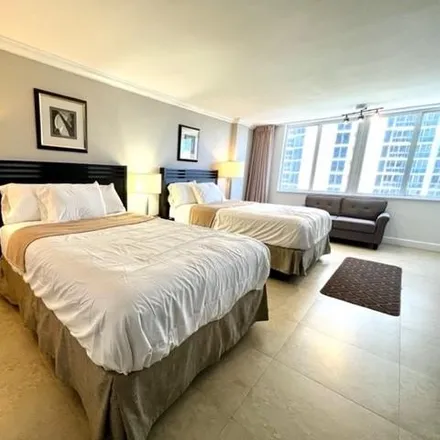 Buy this studio condo on Ramada Plaza Marco Polo Beach Resort in 19201 Collins Avenue, Golden Shores