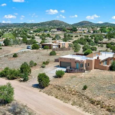 Buy this 3 bed house on 11 Valencia Loop in Santa Fe County, NM 87508