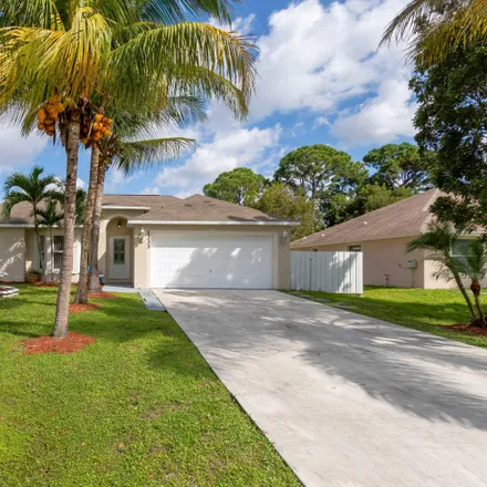 Buy this 4 bed house on 1333 Southwest California Boulevard in Port Saint Lucie, FL 34953