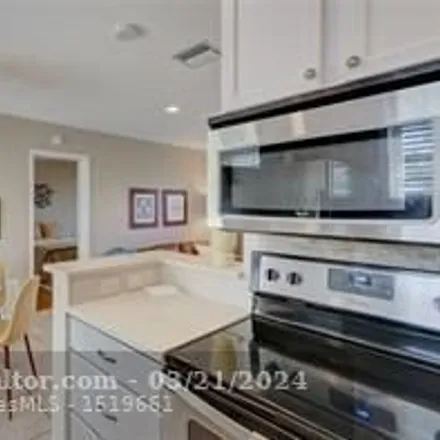 Rent this 2 bed condo on 2696 Northeast 30th Place in Coral Ridge, Fort Lauderdale