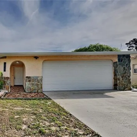 Buy this 2 bed house on 8156 Medford Drive in Jasmine Estates, FL 34668