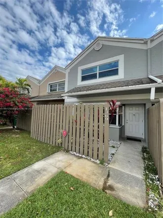 Buy this 2 bed townhouse on 1353 Northwest 123rd Avenue in Pembroke Pines, FL 33026