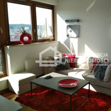 Rent this 3 bed apartment on Arkadiusza Rybickiego 4C in 81-340 Gdynia, Poland