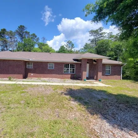 Rent this 3 bed house on 2704 Edgewood Drive in Santa Rosa County, FL 32566