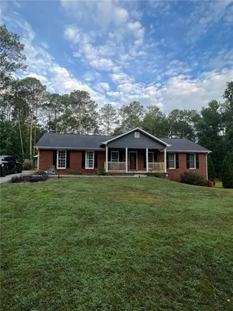 Rent this 4 bed house on 4299 Panola Lake Circle in Stonecrest, GA 30038