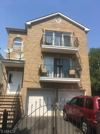 Buy this 9 bed townhouse on 583 Hawthorne Avenue in Newark, NJ 07112