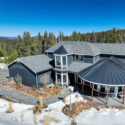 Buy this 5 bed house on 9508 South Marauder Drive in Conifer, CO 80433