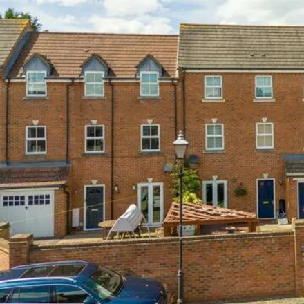 Buy this 4 bed townhouse on Hickman Street in Fairford Leys, HP19 7GJ
