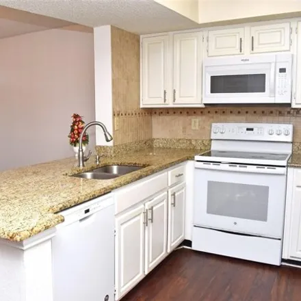 Rent this 2 bed condo on Little Caesars in Terrace Heights Condominiums, Irving
