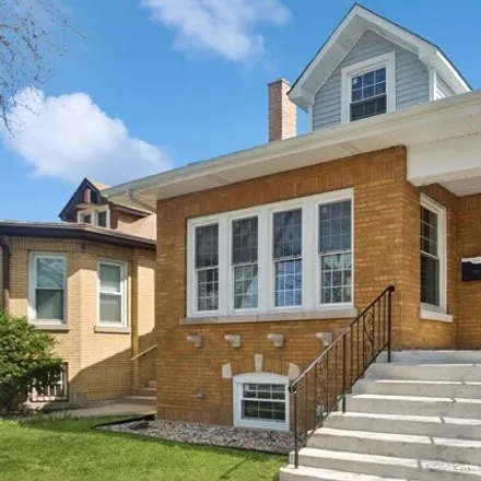 Buy this 5 bed house on 5523 North Saint Louis Avenue in Chicago, IL 60659