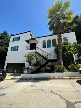 Buy this 4 bed house on 3324 Oakley Drive in Los Angeles, CA 90068