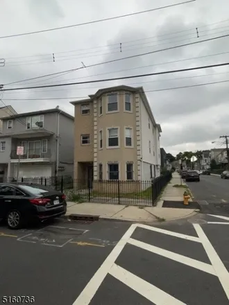 Buy this 6 bed townhouse on 36 Saint James Place in Newark, NJ 07112