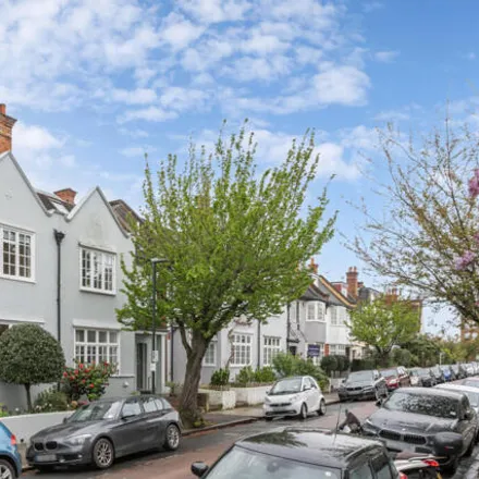 Buy this 4 bed townhouse on 39 Clavering Avenue in London, SW13 8DX