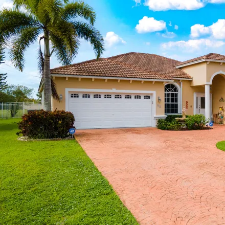 Buy this 4 bed house on 826 Southwest College Park Road in Port Saint Lucie, FL 34953