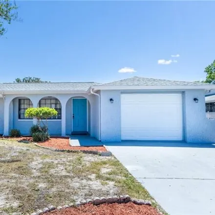 Buy this 3 bed house on 7904 Tina Court in Bayonet Point, FL 34668