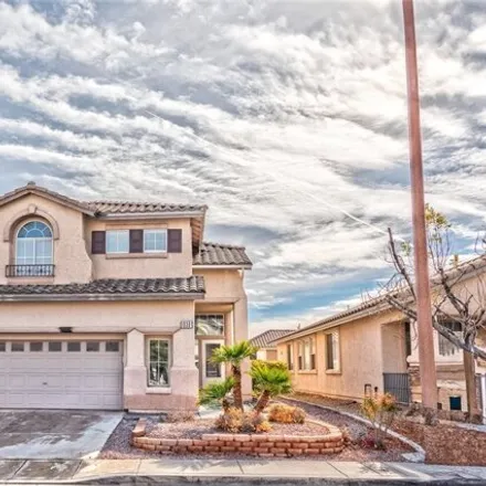 Rent this 4 bed house on 10339 Trailing Dalea Avenue in Summerlin South, NV 89135