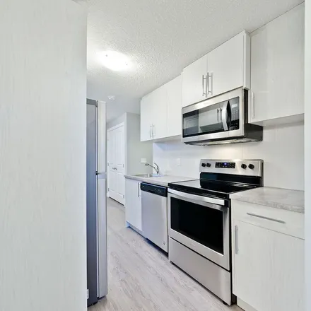 Image 2 - Bow River Pathway (South), Calgary, AB T2P 2C4, Canada - Apartment for rent
