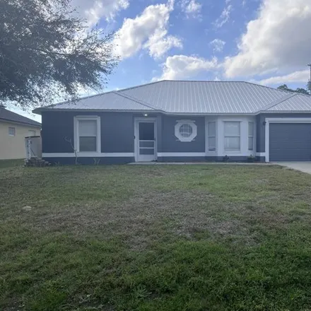 Buy this 3 bed house on 3114 Weyburn Avenue Southeast in Palm Bay, FL 32909