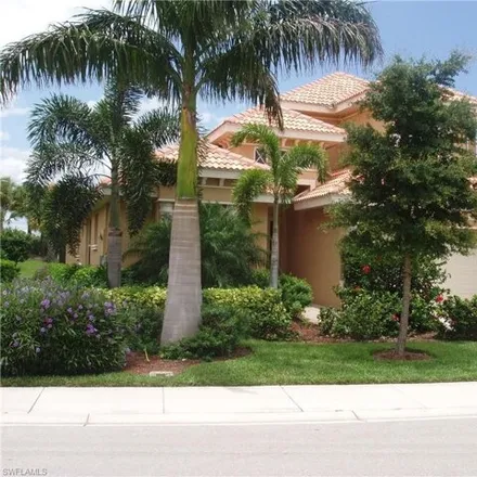 Rent this 4 bed house on 10356 Porto Romano Drive in Coastal Village Apartments, Lee County