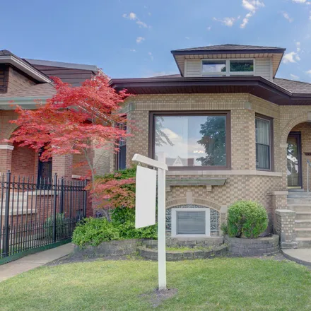 Buy this 4 bed house on 5711 West Cornelia Avenue in Chicago, IL 60634