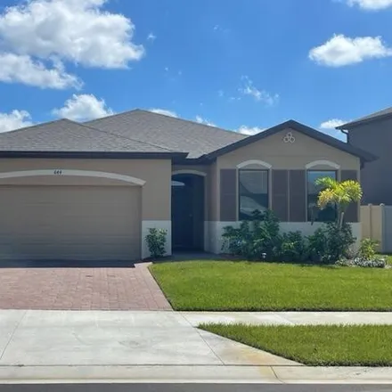 Buy this 4 bed house on 1001 Condor Street Southeast in Palm Bay, FL 32909
