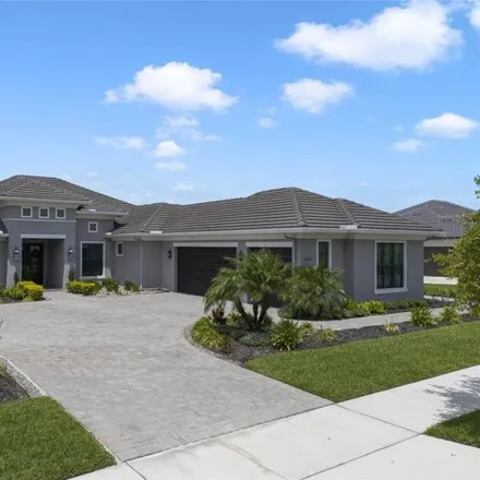 Buy this 4 bed house on 32005 Red Tail Blvd in Sorrento, Florida