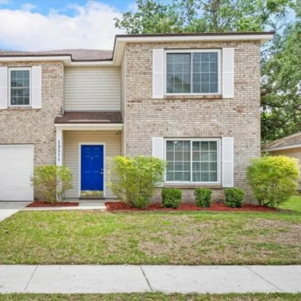 Buy this 4 bed house on 13567 Ashford Wood Court West in Jacksonville, FL 32218