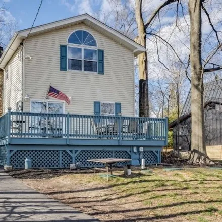 Buy this 2 bed house on 29 Point Breeze Drive in Upper Greenwood Lake, West Milford