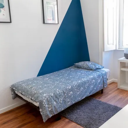 Rent this 7 bed room on Rua António Pedro 52 in 1000-040 Lisbon, Portugal