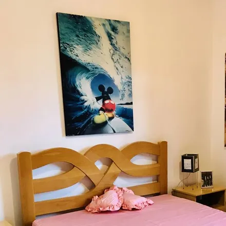 Rent this 4 bed house on Praia Grande in Região Geográfica Intermediária de São Paulo, Brazil