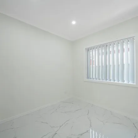 Rent this 3 bed apartment on Passefield Street in Sydney NSW 2170, Australia