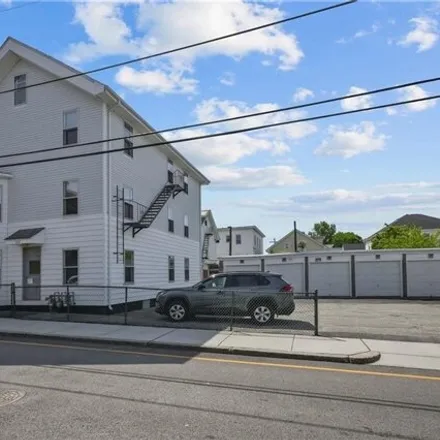 Buy this 9 bed house on 150 Sylvian Street in Central Falls, RI 02863