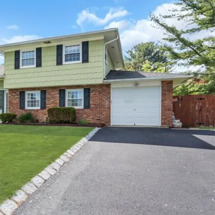 Buy this 4 bed house on 6 Westbrook Cir in Howell, New Jersey