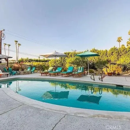 Rent this 3 bed apartment on 938 North Biskra Road in Palm Springs, CA 92262