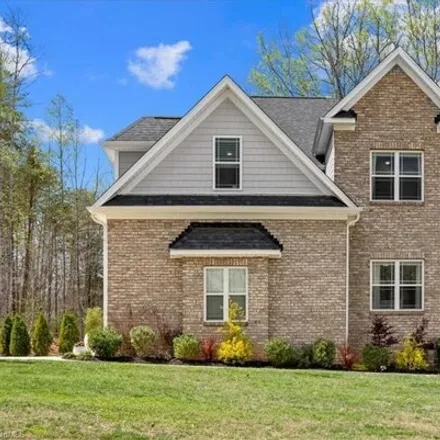 Buy this 4 bed house on 7595 Bentridge Forest Drive in Guilford County, NC 27284