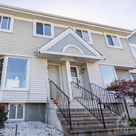 Buy this 3 bed townhouse on 30 McDermot Court in Ottawa, ON K2L 4E8