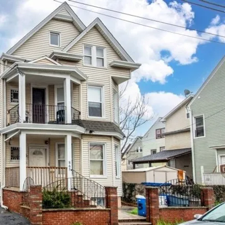 Buy this 8 bed house on 887 East 22nd Street in Paterson, NJ 07513