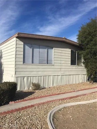 Buy this 3 bed house on 6000 Great Smokey Avenue in Clark County, NV 89156