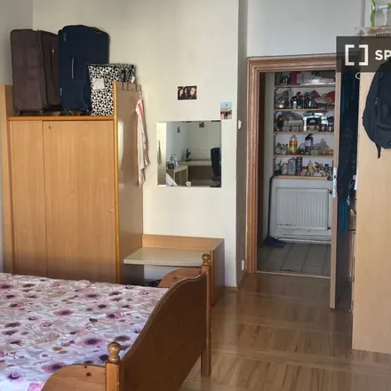 Rent this 4 bed room on CopyCanShop in Lucemburská, 120 09 Prague
