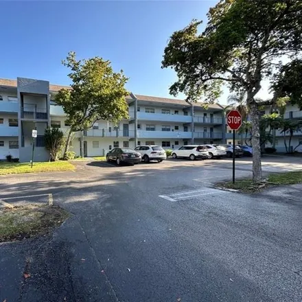 Buy this 2 bed condo on Colony West Golf Club - Championship Course in 6800 North Pine Island Road, Tamarac