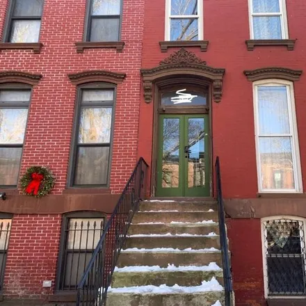 Buy this 5 bed house on 346 Halsey Street in New York, NY 11216