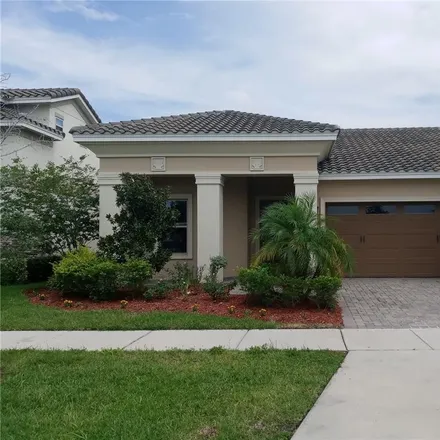 Rent this 4 bed house on 13300 Halkyn Point in Orange County, FL 32832