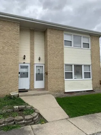 Buy this 3 bed townhouse on 1833 North 15th Avenue in Melrose Park, IL 60160