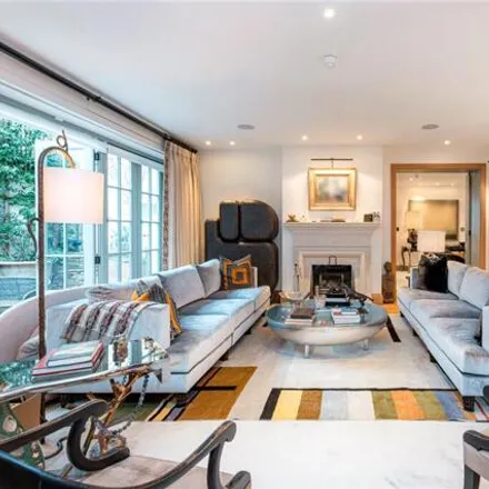 Buy this 4 bed townhouse on Grosvenor Studios in Grosvenor Cottages, London